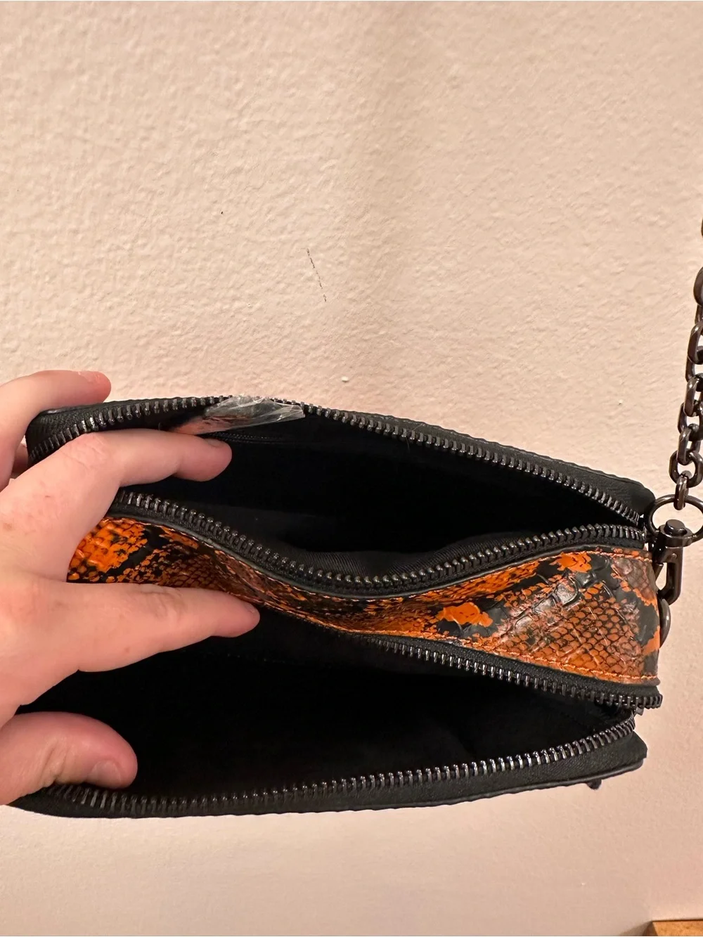 GUESS Orange and Black Snake-Print Crossbody Bag